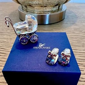 Swarovski baby carriage, baby shoes and mirror to set pieces on. Sold as a set.